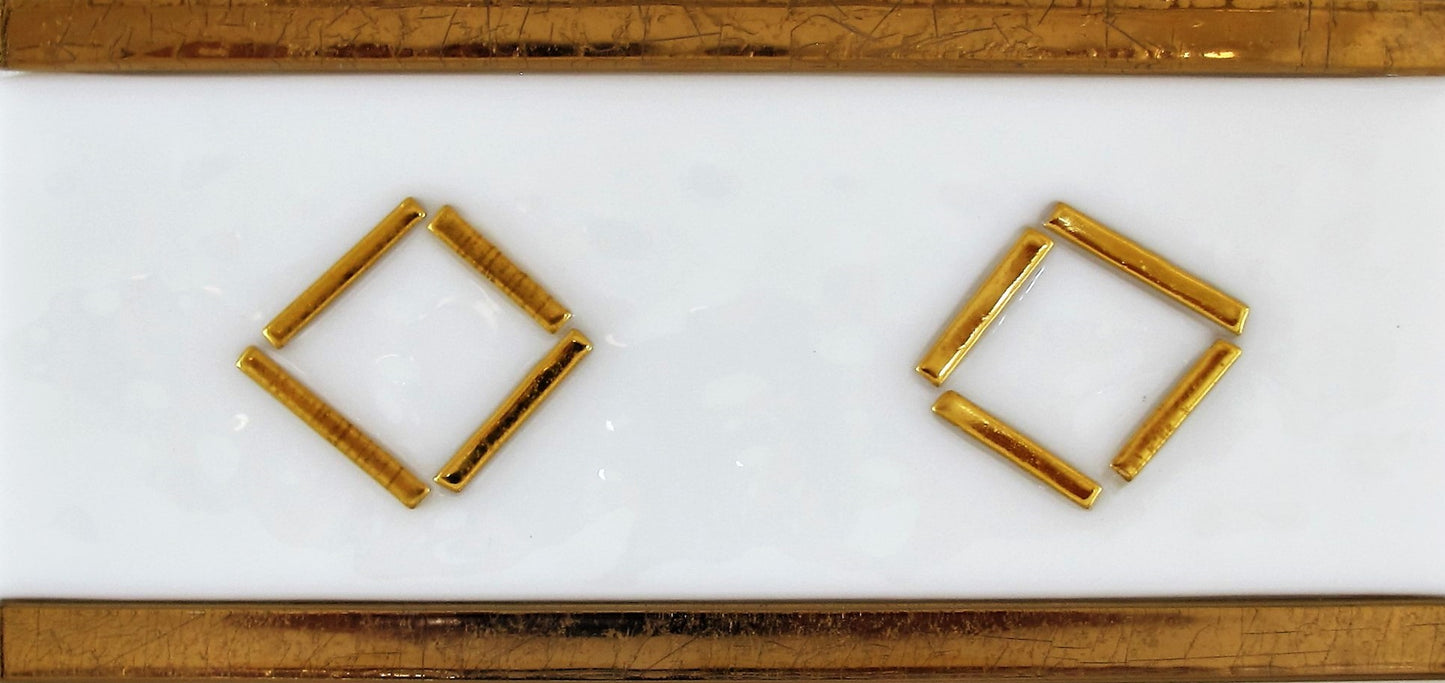 Raised Gold on White Tile