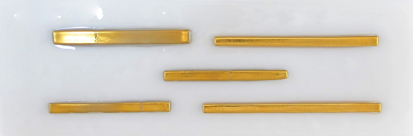 Raised Gold on White Tile