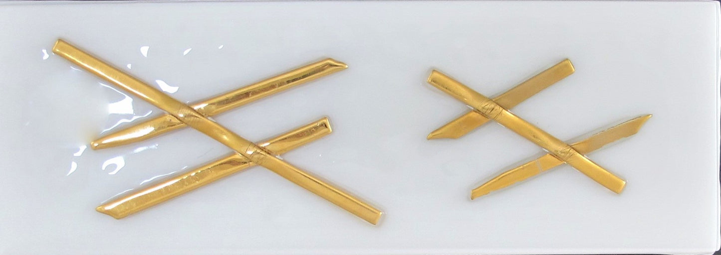 Raised Gold on White Tile